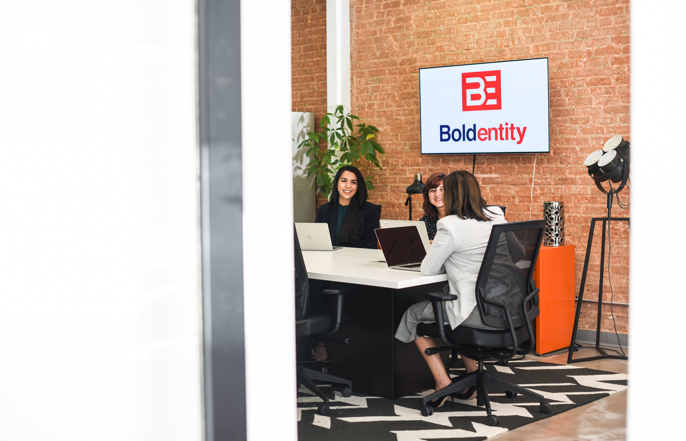 Bold Entity team working together to create digital marketing strategies that help our clients meet their objectives